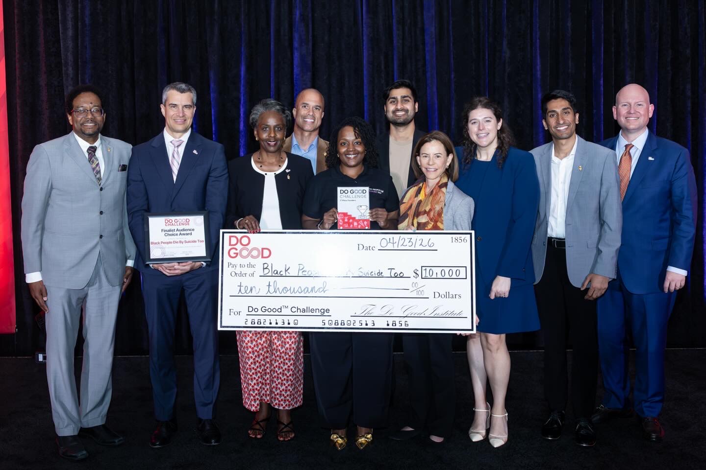 T-Kea Blackman Winning Do Good Challenge Finals with check and UMD affiliates 
